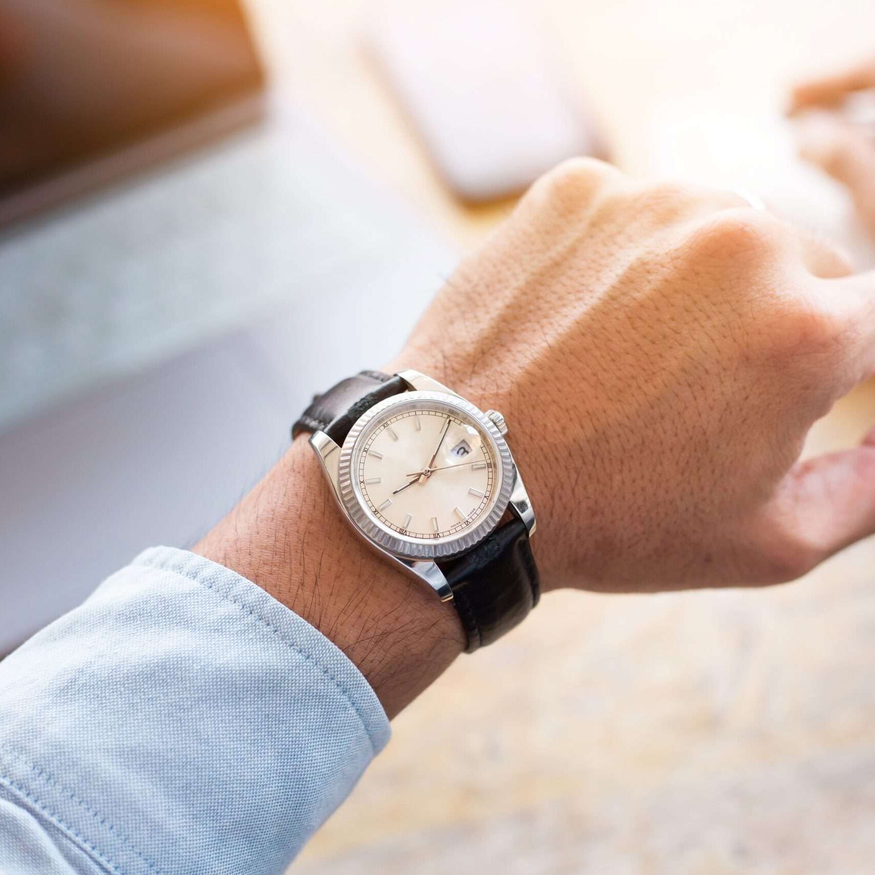 Looking,At,Luxury,Watch,On,Hand,Check,The,Time,Writing